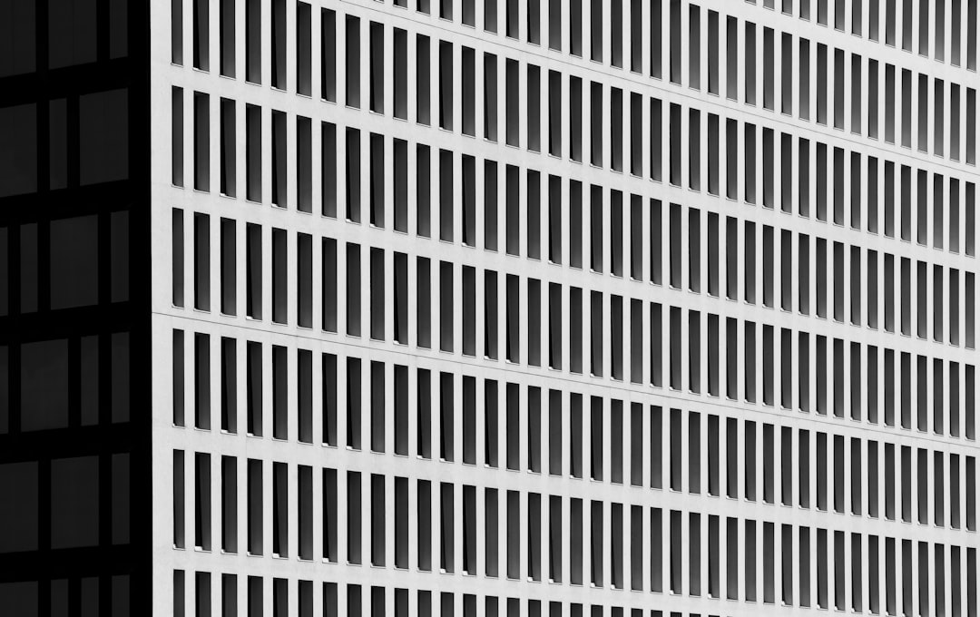 a tall building with a clock on the side of it