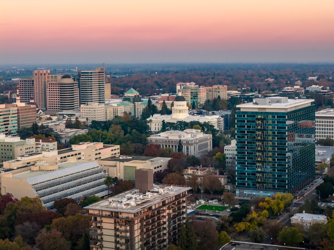 City skyline with capitol building at sunset
